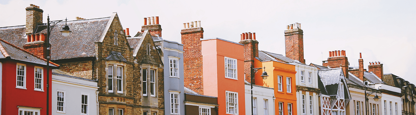 Orange and brown terrace houses with large chimneys
