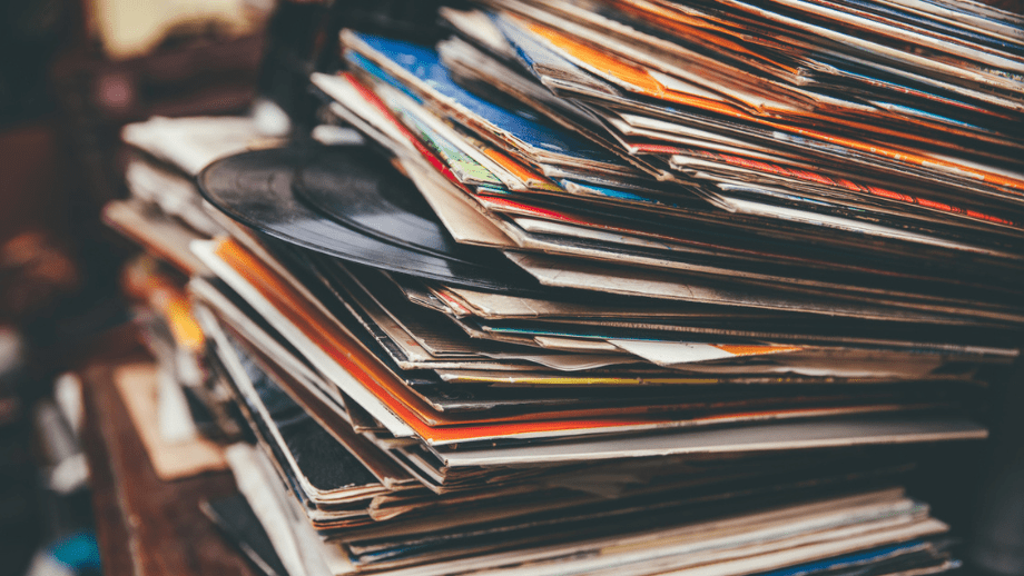 Messy stack of vinyl records